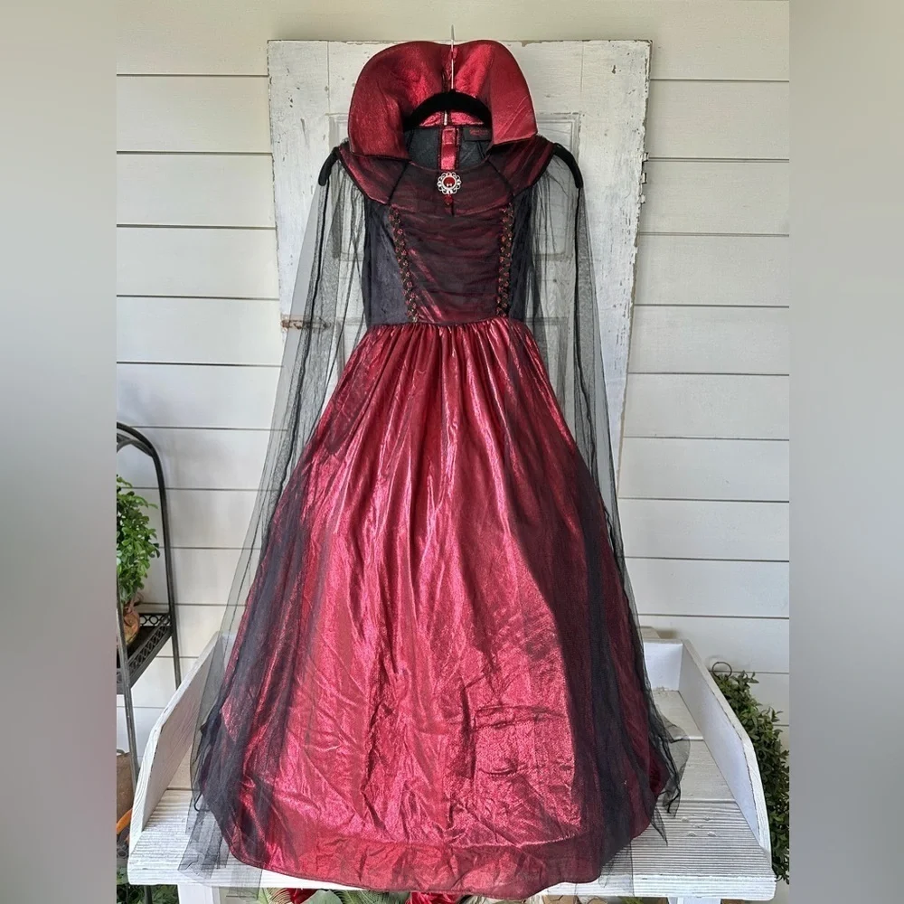 HALLOW’S EVE, GIRLS WITCH COSTUME.LONG DRESS WITH HOOP,IN RED/BLACK.SIZE S(7-8)